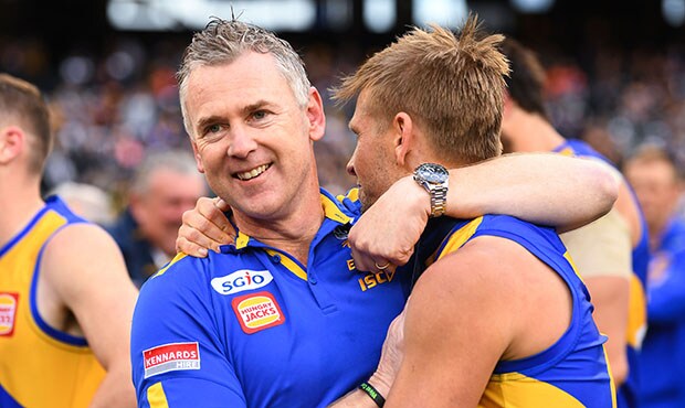 AFL 2018 Toyota AFL Grand Final - West Coast v Collingwood MELBOURNE, AUSTRALIA - SEPTEMBER 29: Adam Simpson, coach of the Eagles embraces Mark LeCras, West Coast Eagles after the win during the 2018 Toyota AFL Grand Final match between the West Coast Eagles and the Collingwood Magpies at the Melbourne Cricket Ground on September 29, 2018 in Melbourne, Australia. (Photo by Daniel Carson/AFL Media)